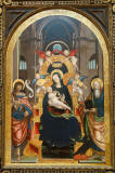 Defendente_Ferrari-Enthroned_Madonna_and_Child_with_Saints_John_the_Baptist_and_John_the_Evangelist-by_1525-oil_on_wood_panel-Chazen_Museum_of_Art