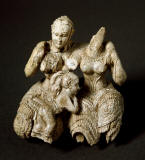 Mycenaean-Mycenian_Art_ivory_idol_composed_of_two_deities_and_a_child-1500museo-atenas